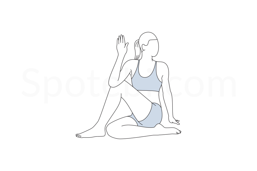 Half Lord of the Fishes Pose or Ardha Matsyendrasana performed by a  caucasian young man on the colorful mat by wearing black attire Stock Photo  - Alamy